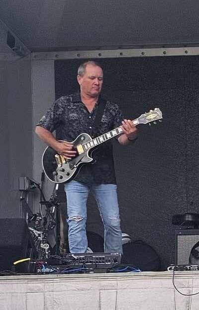 Steve Young playing guitar